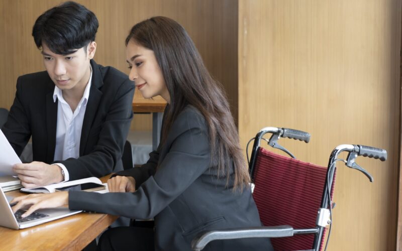 handicapped-woman-in-wheelchair-working-on-new-bus-2024-11-27-04-30-03-utc